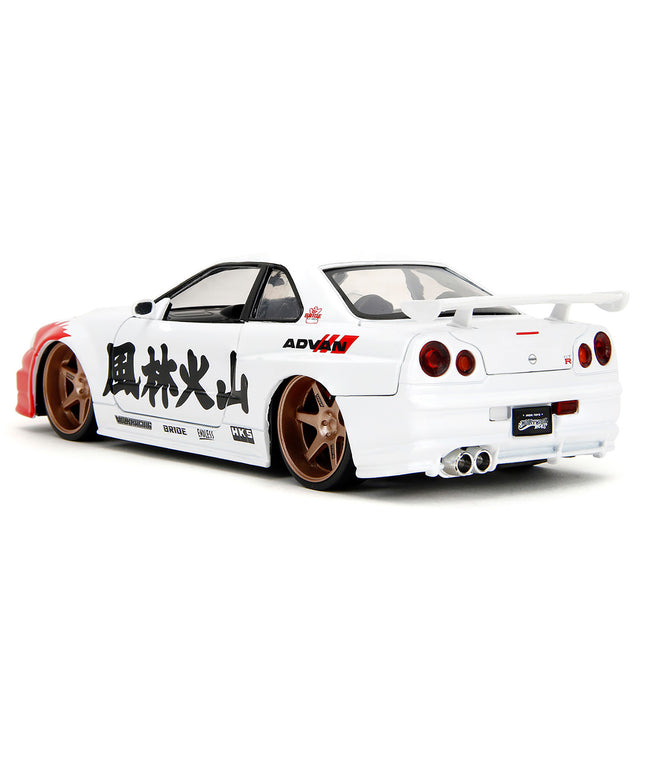 2002 Nissan Skyline GT-R (R34) RHD (Right Hand Drive) White with Red Graphics and Ryu Diecast Figure "Street Fighter" Video Game "Anime Hollywood Rides" Series 1/24 Diecast Model Car by Jada